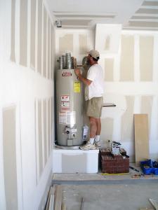 Jake is working on a traditional water heater repair in Glendale AZ